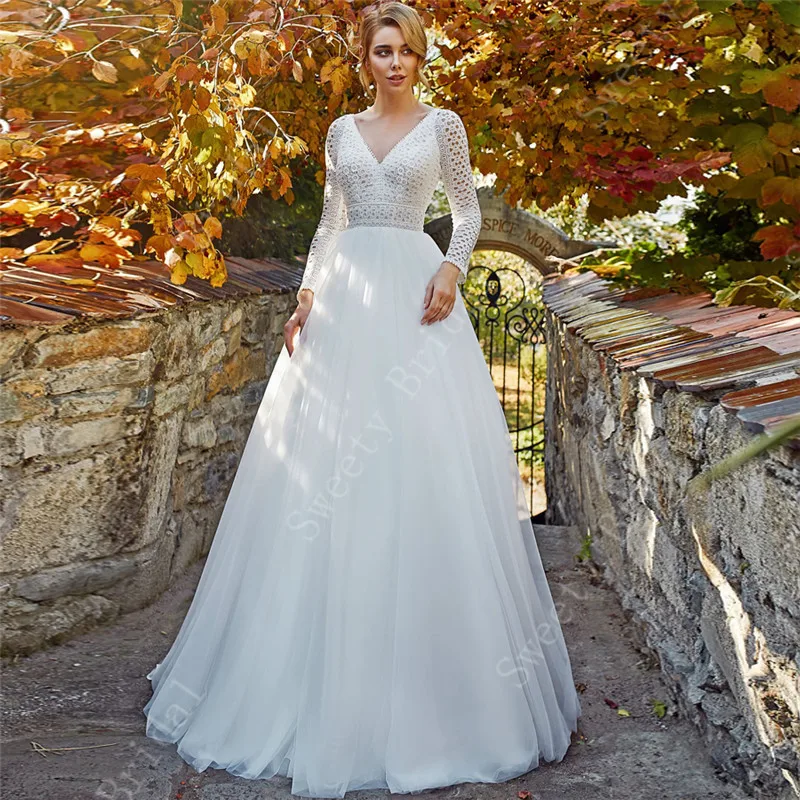 Long Sleeves Boho Wedding Dresses 2021 V Neck Lace Appliques Beach Bridal Gowns Open Back Vestido De Noiva Sweep Train
Long Sleeves Boho Wedding Dresses 2021 V Neck Lace Appliques Beach Bridal Gowns Open Back Vestido De Noiva Sweep Train