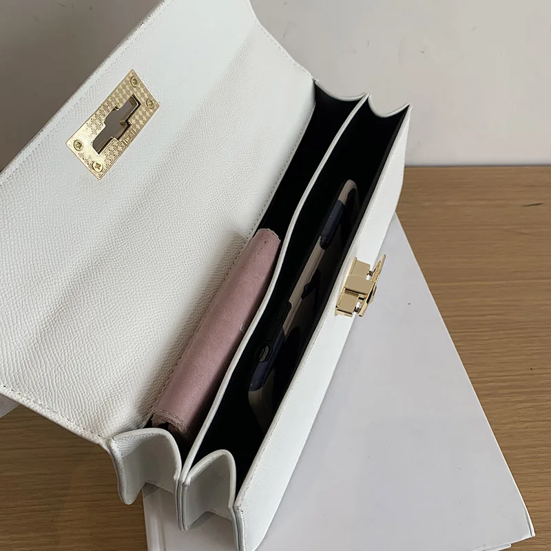 Personality Women Handbags PU Leather Designer Quality Lock Trendy Bag 2021 New Korean Ladies Shoulder Armpit Bag
Personality Women Handbags PU Leather Designer Quality Lock Trendy Bag 2021 New Korean Ladies Shoulder Armpit Bag