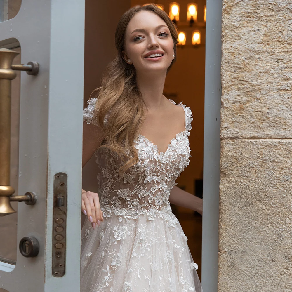 Elegant V-neck Applique Tulle Wedding Dress 2021 Fashion Cap Sleeve Button Back Bridal Dress Vestido de Novia
Elegant V-neck Applique Tulle Wedding Dress 2021 Fashion Cap Sleeve Button Back Bridal Dress Vestido de Novia