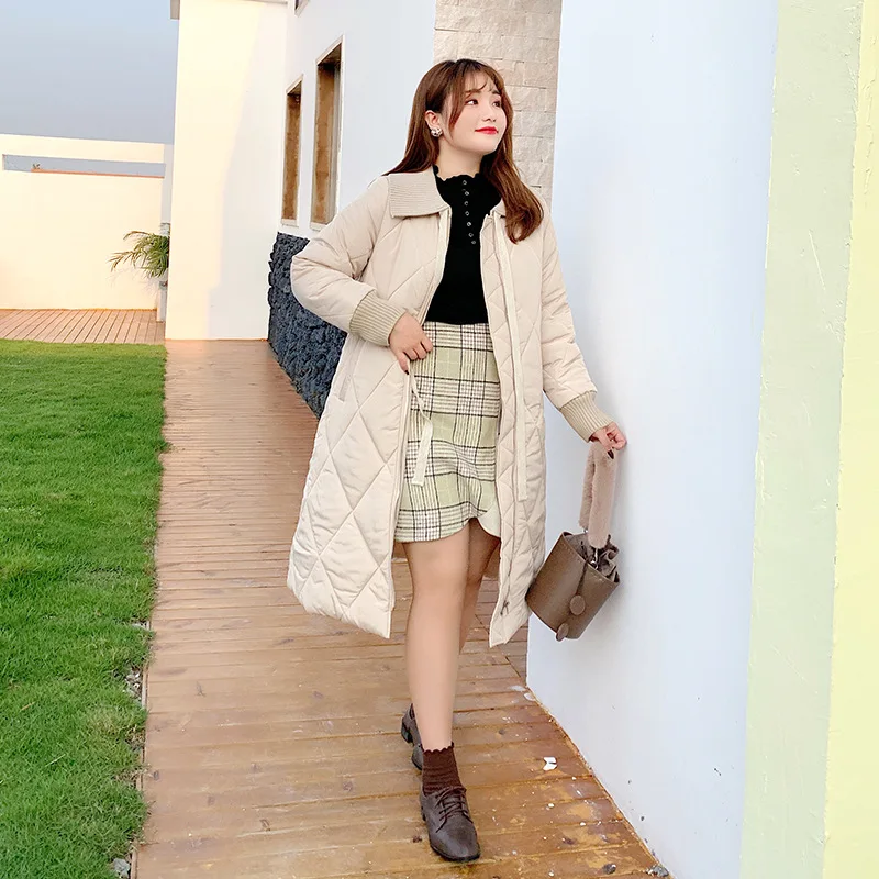 Large size women's fat mm winter new doll collar sling diamond long coat 
Large size women's fat mm winter new doll collar sling diamond long coat