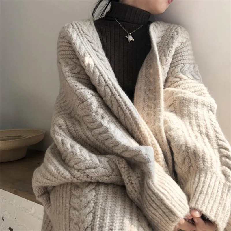 Autumn Long Sleeve Soft Korean Style Knitted Cardigan Women V Neck Chic Cotton Warm Sweaters Solid Color Long Thickened Cardigan 
Autumn Long Sleeve Soft Korean Style Knitted Cardigan Women V Neck Chic Cotton Warm Sweaters Solid Color Long Thickened Cardigan