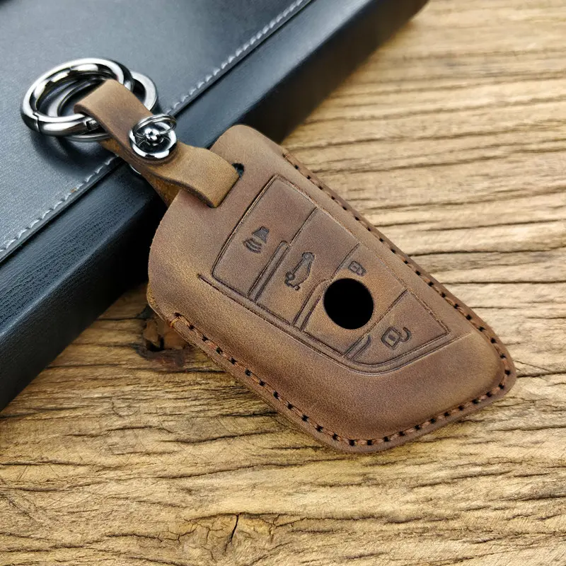 Leather key cover for BMW X5 F15 X6 F16 G30 7 Series G11 X1 F48 f39 car key case keychain car holder car styling protective new
Leather key cover for BMW X5 F15 X6 F16 G30 7 Series G11 X1 F48 f39 car key case keychain car holder car styling protective new