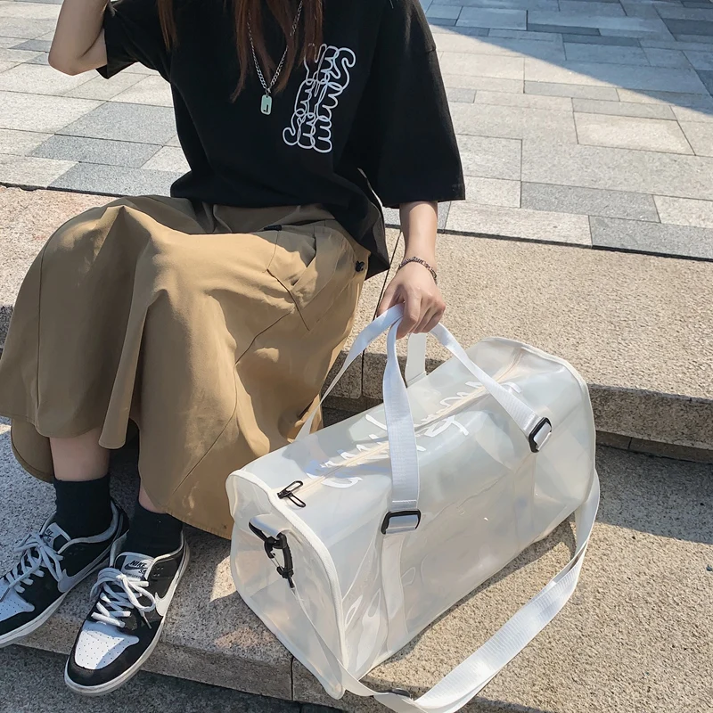 2021 summer new trend fashion sports PVC transparent portable travel bag large capacity outdoor shoulder bag
2021 summer new trend fashion sports PVC transparent portable travel bag large capacity outdoor shoulder bag