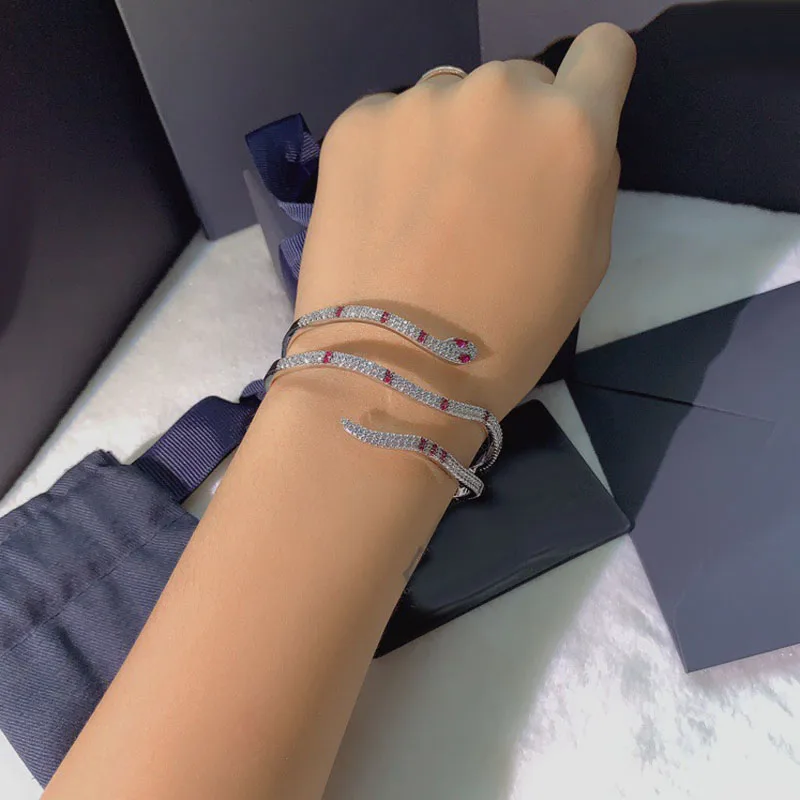 UMGODLY Luxury Copper Snake Bangle with Pink Eyes AAA Cubic Zirconia Animal Bracelet Cuff Women Fashion Party Jewelry
UMGODLY Luxury Copper Snake Bangle with Pink Eyes AAA Cubic Zirconia Animal Bracelet Cuff Women Fashion Party Jewelry