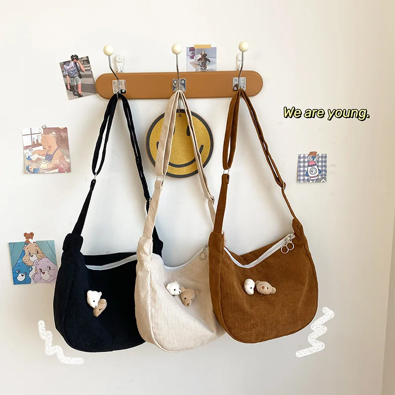 Fashion all-match casual shoulder bag bear pendant soft sister student corduroy messenger bag
Fashion all-match casual shoulder bag bear pendant soft sister student corduroy messenger bag