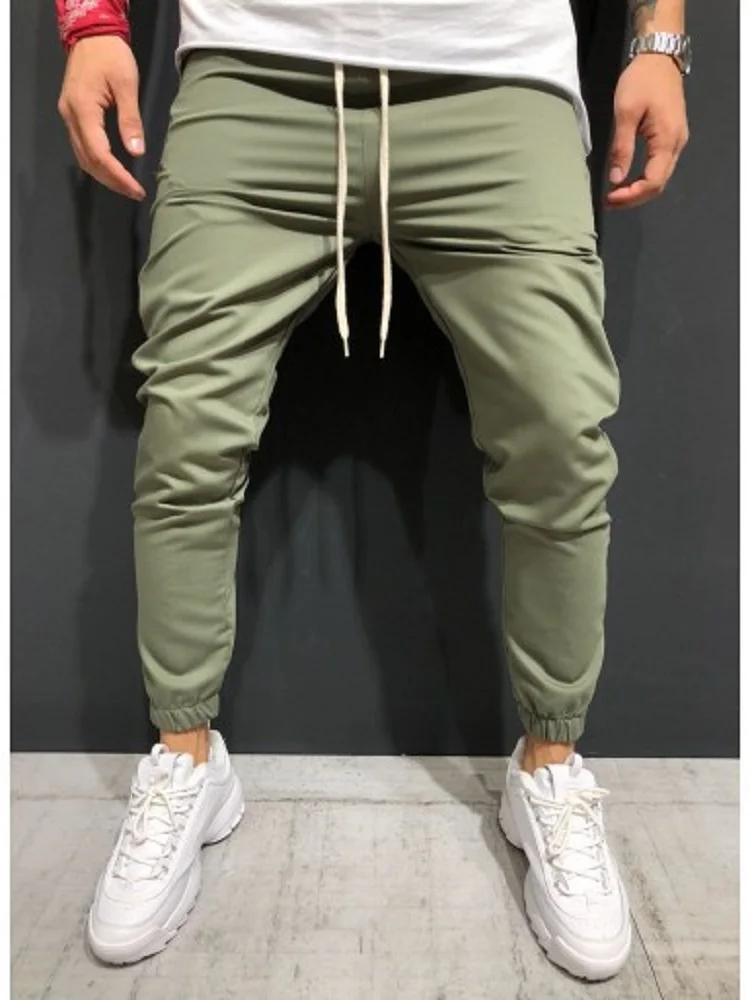 Autumn New Men's Sports Pants Jogging Running Feet Slim Casual Trousers Fitness Sweatpants Baggy Pants Gym Clothing Sportswear 
Autumn New Men's Sports Pants Jogging Running Feet Slim Casual Trousers Fitness Sweatpants Baggy Pants Gym Clothing Sportswear