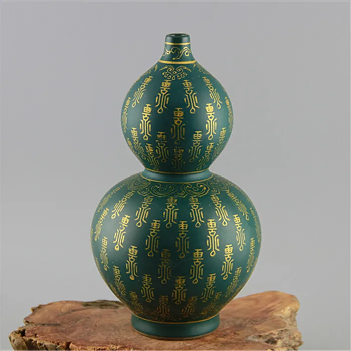 Jingdezhen Antique покрытая эмалью ваза Yong Zheng зеленая глазурованная Золотая долговечность ваза-тыква старые фотоорнаменты
Jingdezhen Antique покрытая эмалью ваза Yong Zheng зеленая глазурованная Золотая долговечность ваза-тыква старые фотоорнаменты