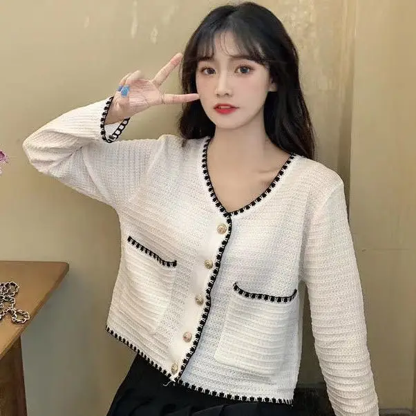 Summer new thin long-sleeved net red sunscreen cardigan knitted outer short coat jacket women 
Summer new thin long-sleeved net red sunscreen cardigan knitted outer short coat jacket women