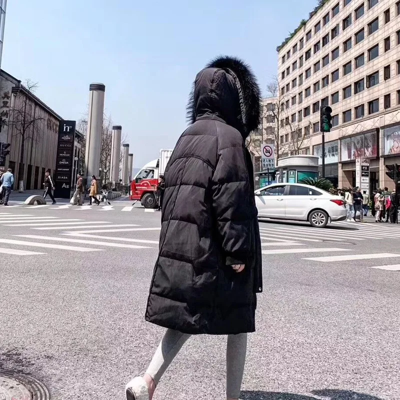 Warm white duck down filled women's down jacket long winter thickening cold raccoon fur big fur collar down jacket women 
Warm white duck down filled women's down jacket long winter thickening cold raccoon fur big fur collar down jacket women