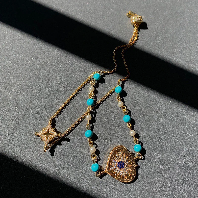 UMGODLY Fashion Brand Bracelet Gold Color Dainty Double Chain Heart Medal and Blue Stones Adjustable Roma Bracelet Women Jewelry
UMGODLY Fashion Brand Bracelet Gold Color Dainty Double Chain Heart Medal and Blue Stones Adjustable Roma Bracelet Women Jewelry