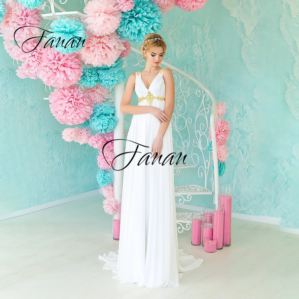 New V-Neck Sleeveless Wedding Dress Backless Simple Lace Appliques Floor Length Bridal Gown robe de soirée de mariage платье 
New V-Neck Sleeveless Wedding Dress Backless Simple Lace Appliques Floor Length Bridal Gown robe de soirée de mariage платье