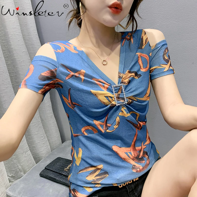 MadBlack Summer Korean Clothes Mesh T-Shirt Sexy V-Neck Hollow Out Print Shiny Diamonds Women Tops Short Sleeve New Tees T1D813A
MadBlack Summer Korean Clothes Mesh T-Shirt Sexy V-Neck Hollow Out Print Shiny Diamonds Women Tops Short Sleeve New Tees T1D813A