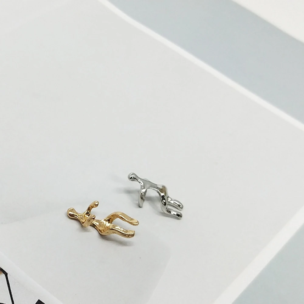 In 2021, The Europe And United States Women's Fashion Personality Contracted Ear Clip Cute Humanoid Decoration Accessories 
In 2021, The Europe And United States Women's Fashion Personality Contracted Ear Clip Cute Humanoid Decoration Accessories