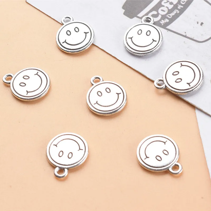 20Pcs/lot 12x15mm Smile Face Alloy Charms Pendant DIY Earrings Bracelet Neacklace Accessories For Jewelry Making Findings
20Pcs/lot 12x15mm Smile Face Alloy Charms Pendant DIY Earrings Bracelet Neacklace Accessories For Jewelry Making Findings