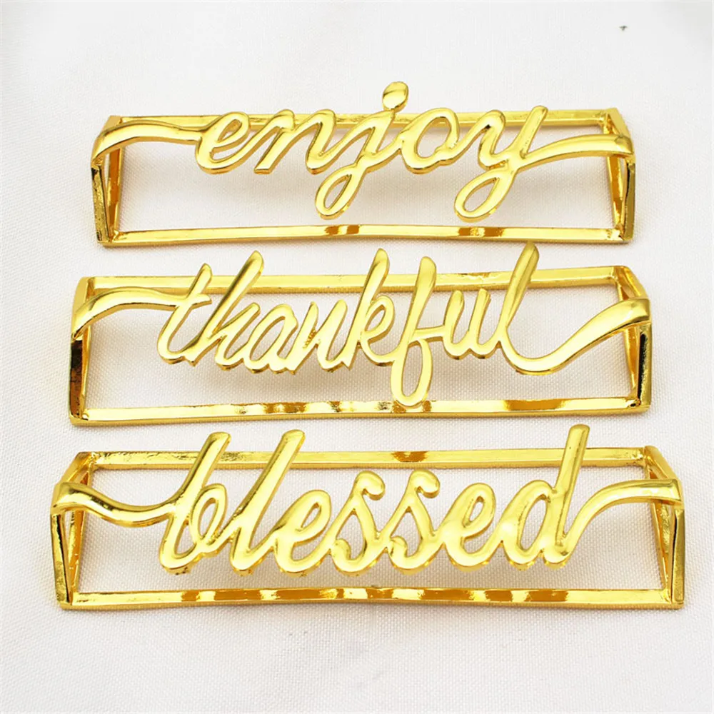 12 / PCS new hotel supplies gold strip letter napkin ring metal napkin ring napkin ring manufacturers wholesale
12 / PCS new hotel supplies gold strip letter napkin ring metal napkin ring napkin ring manufacturers wholesale