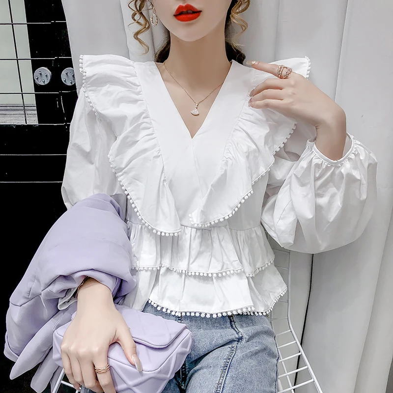 2020 Autumn White Crop Top Blouse Women Korean V-neck Puff Sleeve Short Blouses Tassel Ruffle Frill Sexy High Waist Shirt Tops
2020 Autumn White Crop Top Blouse Women Korean V-neck Puff Sleeve Short Blouses Tassel Ruffle Frill Sexy High Waist Shirt Tops