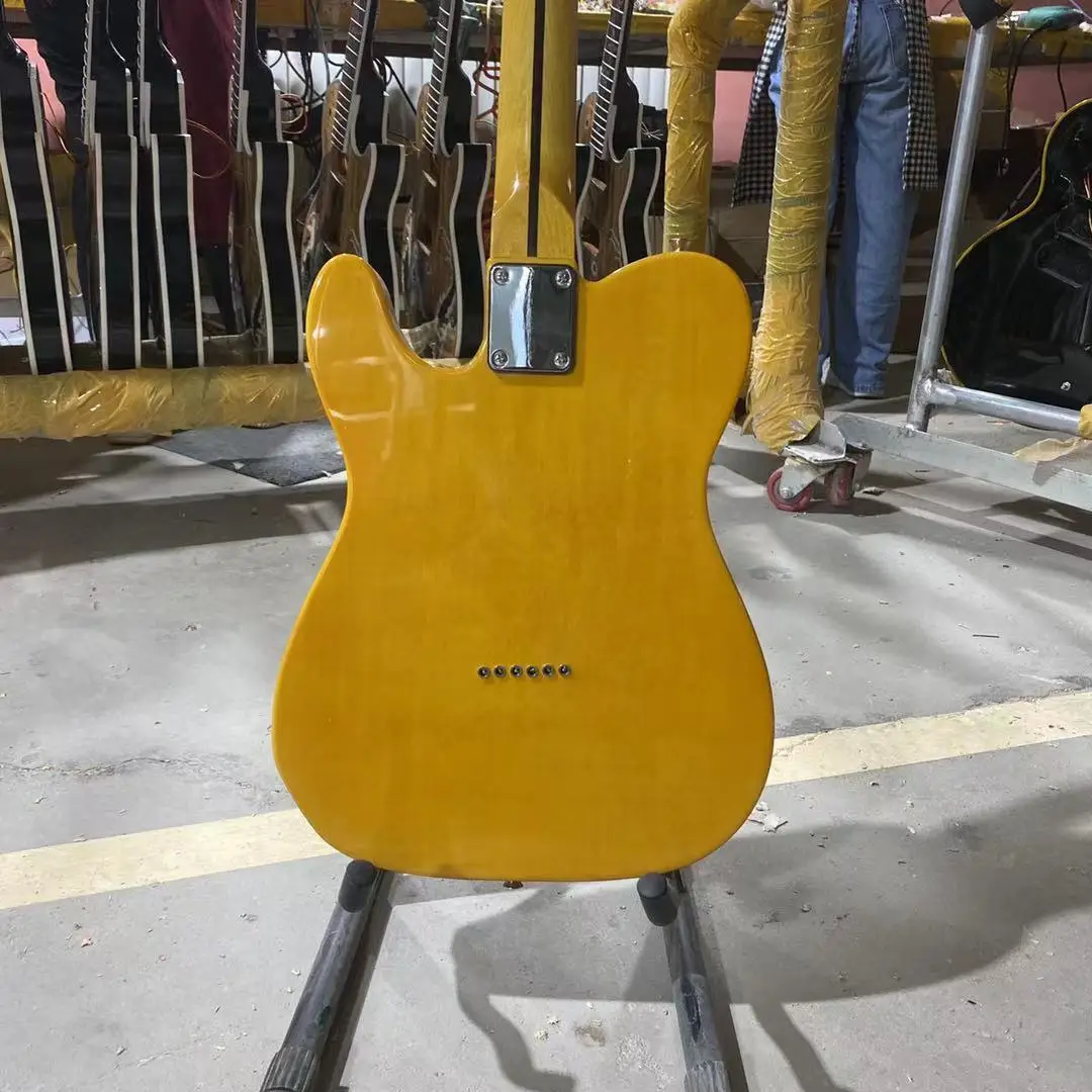 Tele Electric Guitar Maple Fingerboard Nature Yellow Color Black Pickguard Chromed Hardware Free Shipping
Tele Electric Guitar Maple Fingerboard Nature Yellow Color Black Pickguard Chromed Hardware Free Shipping