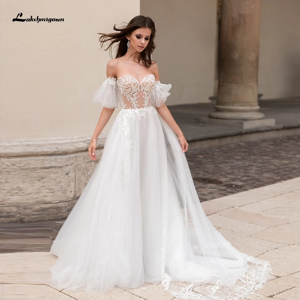 Vestidos Vintage Wedding Dress Short Sleeve Off the Shoulder Princess Bridal Tulle Wedding Gown Sheer Lace Appliques New 2021
Vestidos Vintage Wedding Dress Short Sleeve Off the Shoulder Princess Bridal Tulle Wedding Gown Sheer Lace Appliques New 2021