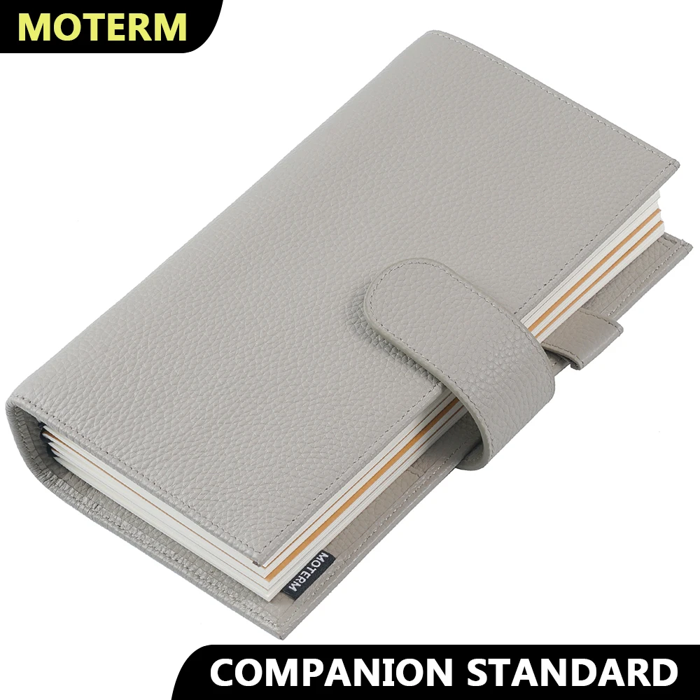 Moterm Companion Travel Journal Standard Size Notebook Genuine Cowhide Organizer with Back Pocket and Clasp
Moterm Companion Travel Journal Standard Size Notebook Genuine Cowhide Organizer with Back Pocket and Clasp