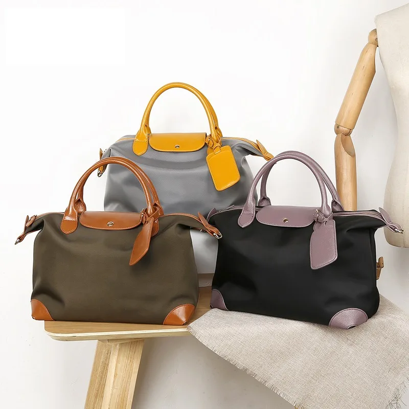 2021 New Messenger Bag Tote Bag Female Large Capacity Shoulder Bag Fashionable Simple Nylon Female Bag Luxury Designer Bag
2021 New Messenger Bag Tote Bag Female Large Capacity Shoulder Bag Fashionable Simple Nylon Female Bag Luxury Designer Bag