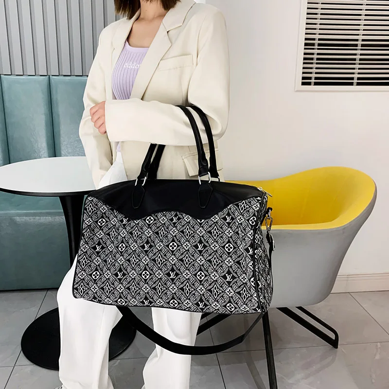 YILIAN The new high-capacity hold-all short-distance travel bag boarding luggage bag bag travel bag business
YILIAN The new high-capacity hold-all short-distance travel bag boarding luggage bag bag travel bag business
