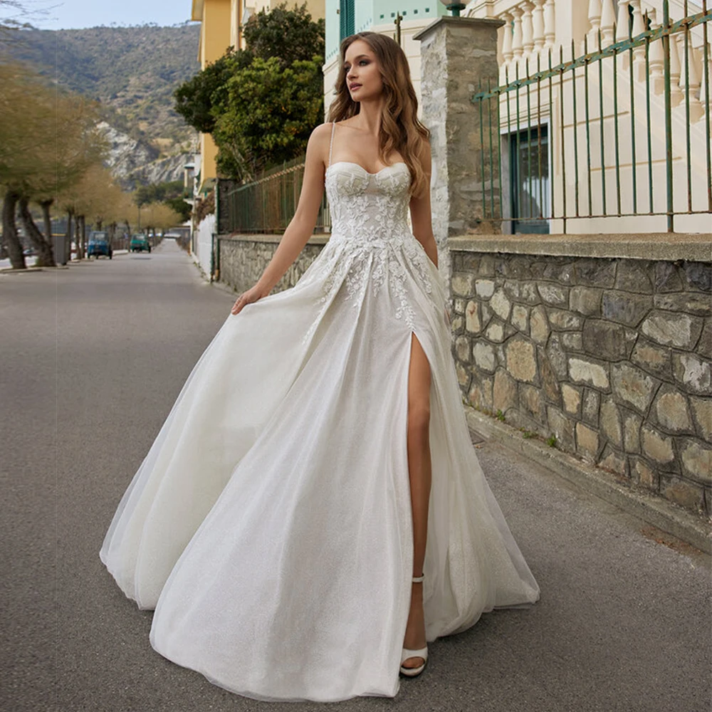 Glam Spaghetti Straps Beach Wedding Dress Boho vestido de noiva Side Split Lace Bridal Dress Appliques Glitter Wedding Gowns
Glam Spaghetti Straps Beach Wedding Dress Boho vestido de noiva Side Split Lace Bridal Dress Appliques Glitter Wedding Gowns