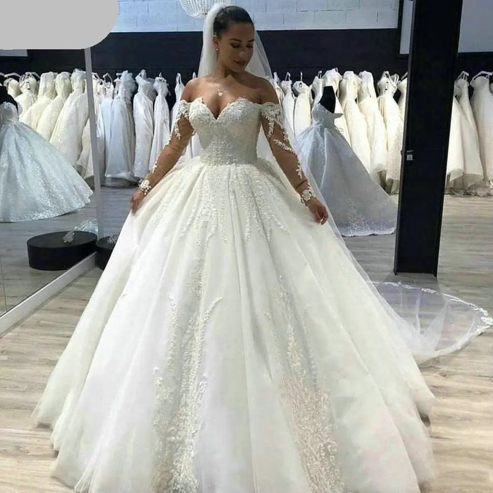 Romantic A Line Wedding Dresses Lace Appliques Off Shoulder Long Sleeves Tulle Ball Gown Robe De Mariee Sweep Train Bride Gown
Romantic A Line Wedding Dresses Lace Appliques Off Shoulder Long Sleeves Tulle Ball Gown Robe De Mariee Sweep Train Bride Gown