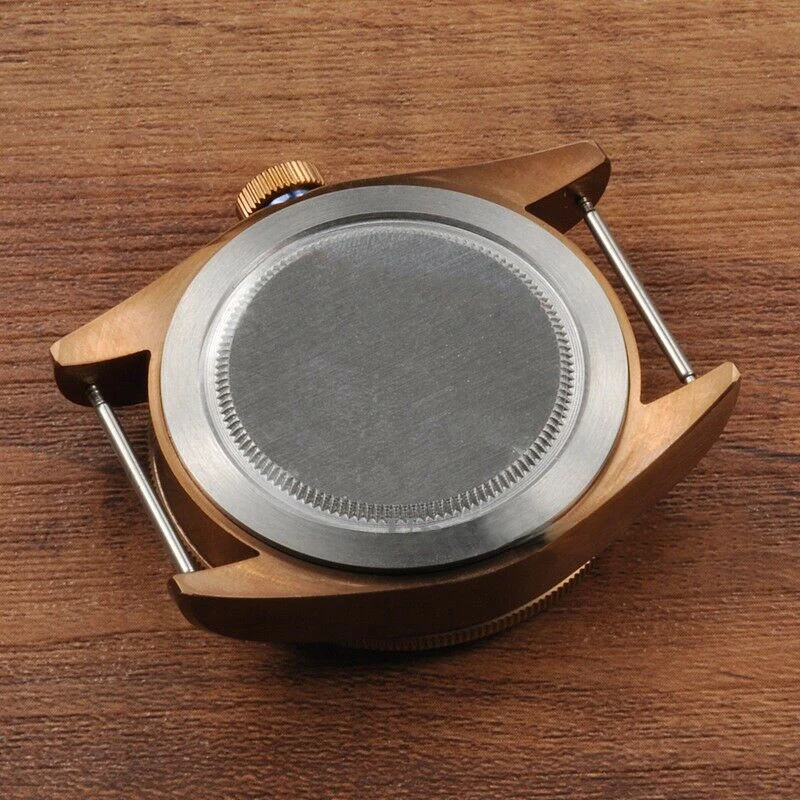 High quality 41mm sapphire glass bronze coated watch case blue bezel fit ETA 2824 2836 Miyota 8215 Automatic movement
High quality 41mm sapphire glass bronze coated watch case blue bezel fit ETA 2824 2836 Miyota 8215 Automatic movement