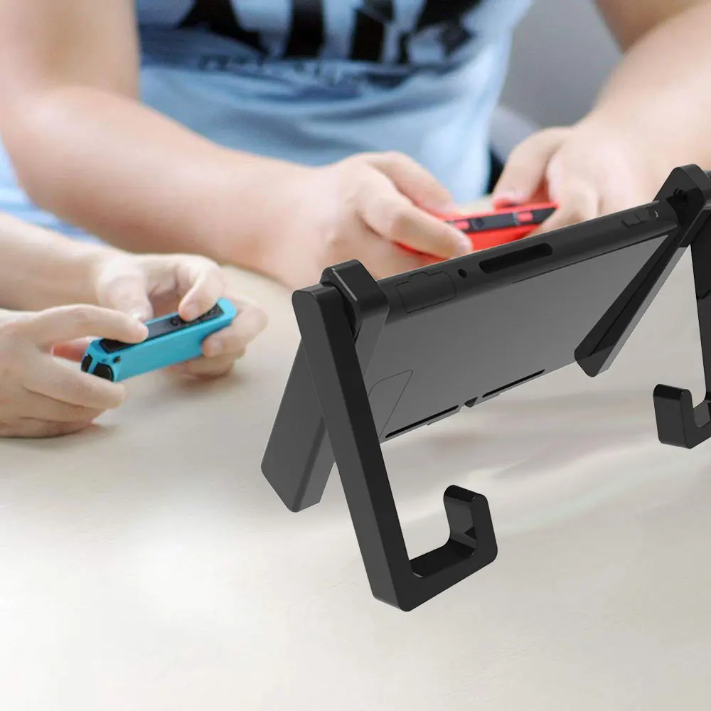 Universal Car Holder For Switch console In Car Mount Stand No Magnetic two in one car bracket NS adjustable desktop Hold
Universal Car Holder For Switch console In Car Mount Stand No Magnetic two in one car bracket NS adjustable desktop Hold