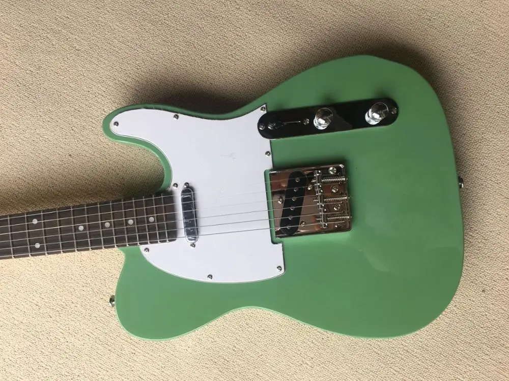 free shipping Chinese guitar factory Custom Guitar High Quality TL Dark green Blue silver natural wood color electric guitar 915
free shipping Chinese guitar factory Custom Guitar High Quality TL Dark green Blue silver natural wood color electric guitar 915