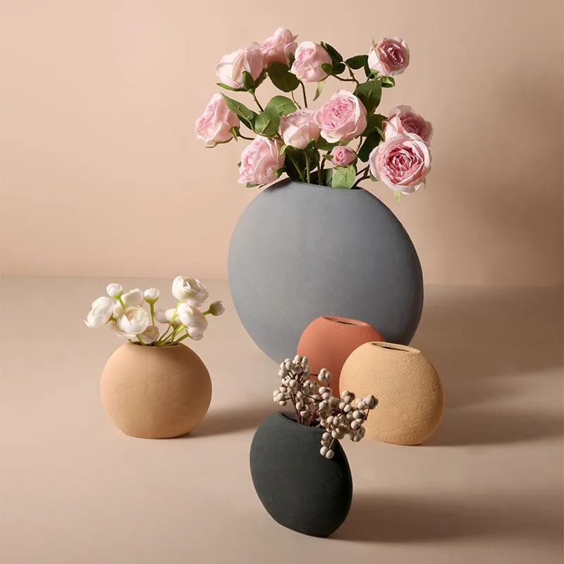 Creative Nordic Round flower vase decoration home Ceramic Vases living room Table ornaments Jarrones decorativos moderno wazon
Creative Nordic Round flower vase decoration home Ceramic Vases living room Table ornaments Jarrones decorativos moderno wazon