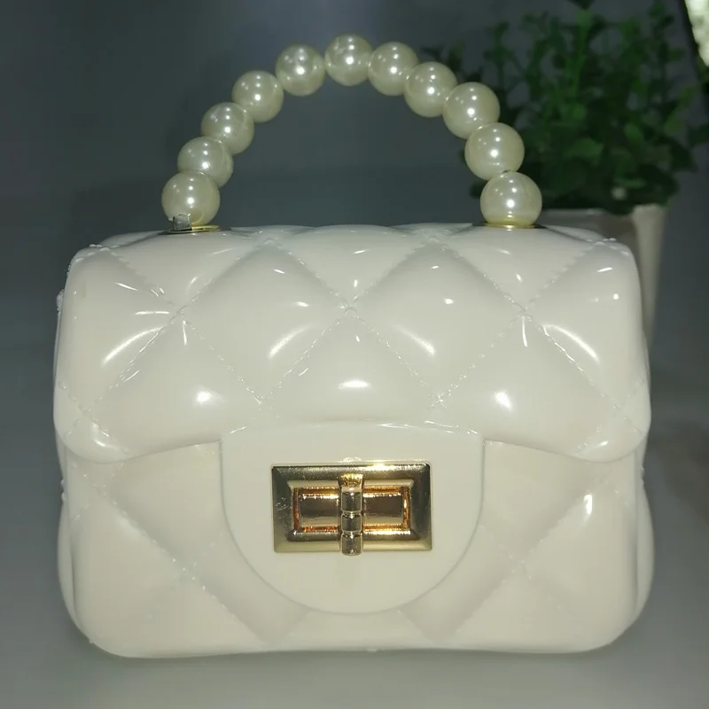 Pearl Portable Jelly Bag Hot Sale PVC Mini Chain Change Key Bag Diamond Small Square Bag Female
Pearl Portable Jelly Bag Hot Sale PVC Mini Chain Change Key Bag Diamond Small Square Bag Female