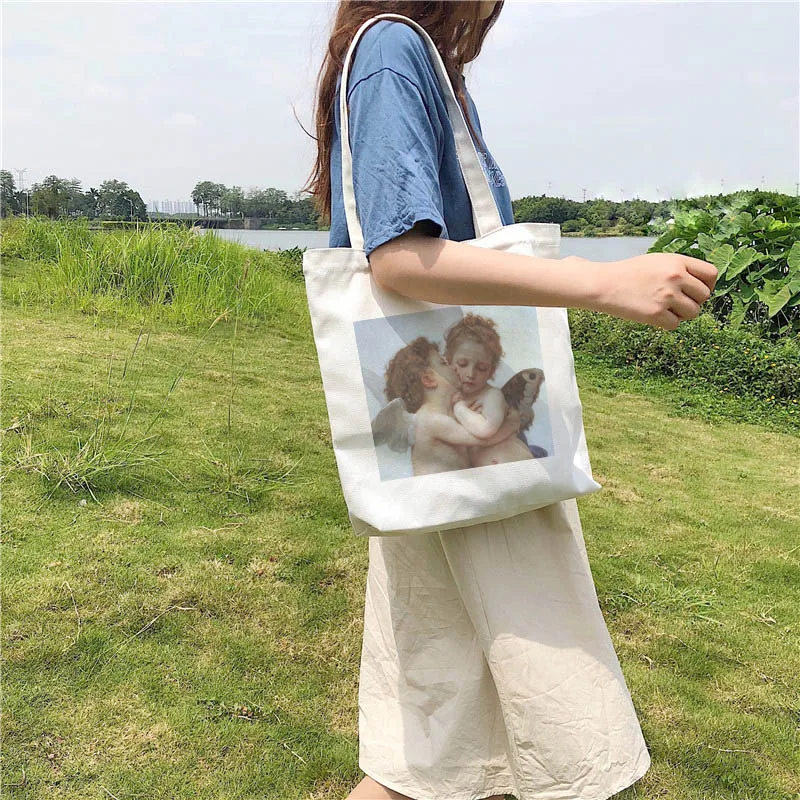 Women Vintage Angel Cotton Canvas Shopper Bag Girl Harajuku 90s Y2K Classic Vintage Shoulder Handbag Female Bolsa Compra
Women Vintage Angel Cotton Canvas Shopper Bag Girl Harajuku 90s Y2K Classic Vintage Shoulder Handbag Female Bolsa Compra