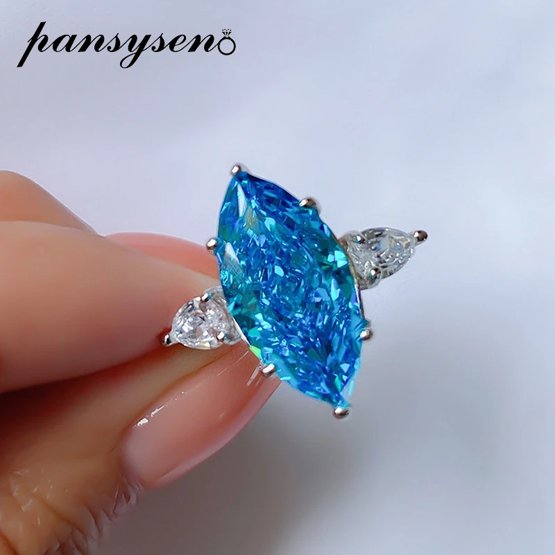 PANSYSEN 100% 925 Sterling Silver Marquise Cut Aquamarine Gemstone Engagement Ring Wedding Bands for Women Fine Jewelry Gifts
PANSYSEN 100% 925 Sterling Silver Marquise Cut Aquamarine Gemstone Engagement Ring Wedding Bands for Women Fine Jewelry Gifts