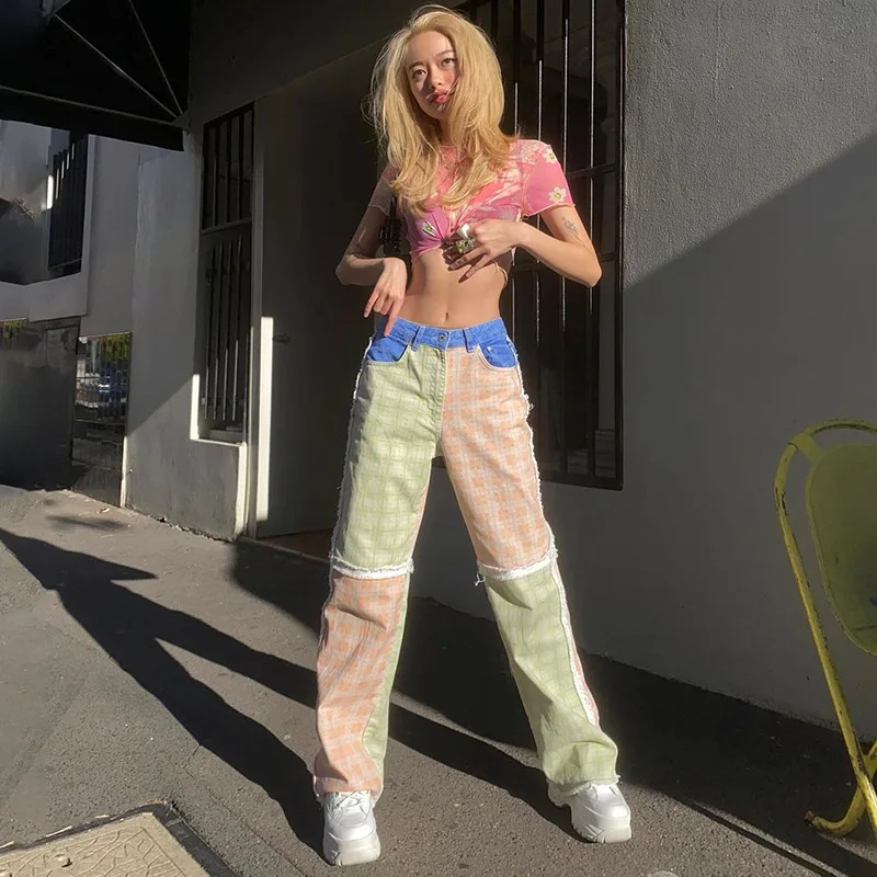 The new style of summer street retro style child print stitching denim trousers 
The new style of summer street retro style child print stitching denim trousers