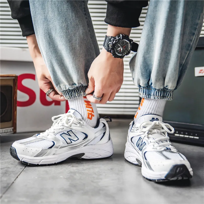 Classic Running Shoes Men's Mesh Breathable Sports Shoes Women's Comfortable Casual All-Match Sneakers Couple Jogging Shoes
Classic Running Shoes Men's Mesh Breathable Sports Shoes Women's Comfortable Casual All-Match Sneakers Couple Jogging Shoes