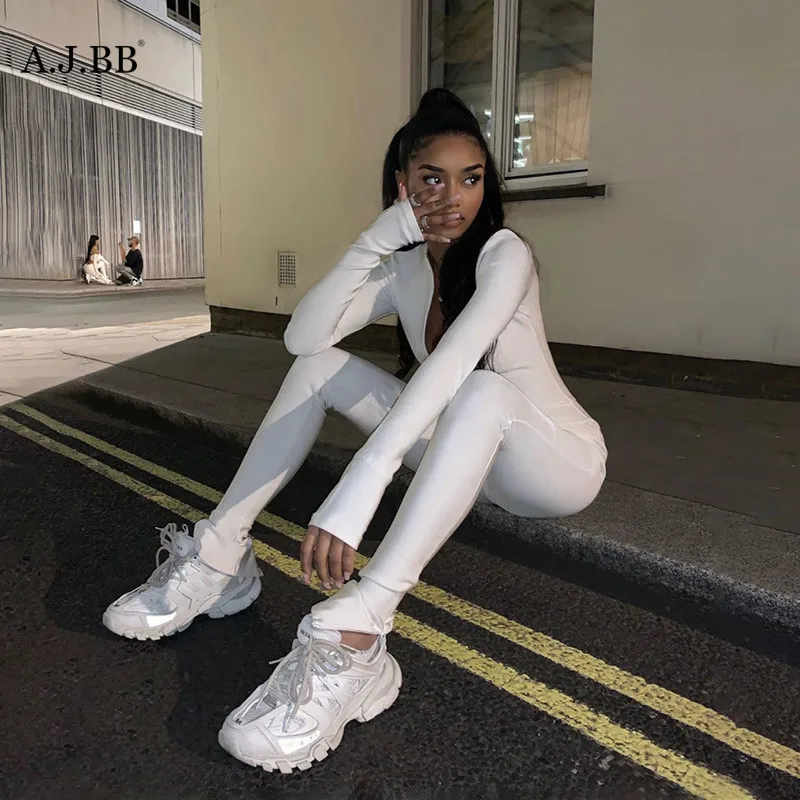 European summer sexy solid color sports Jumpsuit fashion tight zipper standing collar long sleeve women's top pants
European summer sexy solid color sports Jumpsuit fashion tight zipper standing collar long sleeve women's top pants
