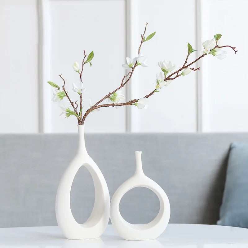 Modern Simple White Ceramic Vase Home Ornaments Crafts Vegetarian Ceramic Flower Pot Art Vases Home Decoration Ornament Gifts
Modern Simple White Ceramic Vase Home Ornaments Crafts Vegetarian Ceramic Flower Pot Art Vases Home Decoration Ornament Gifts