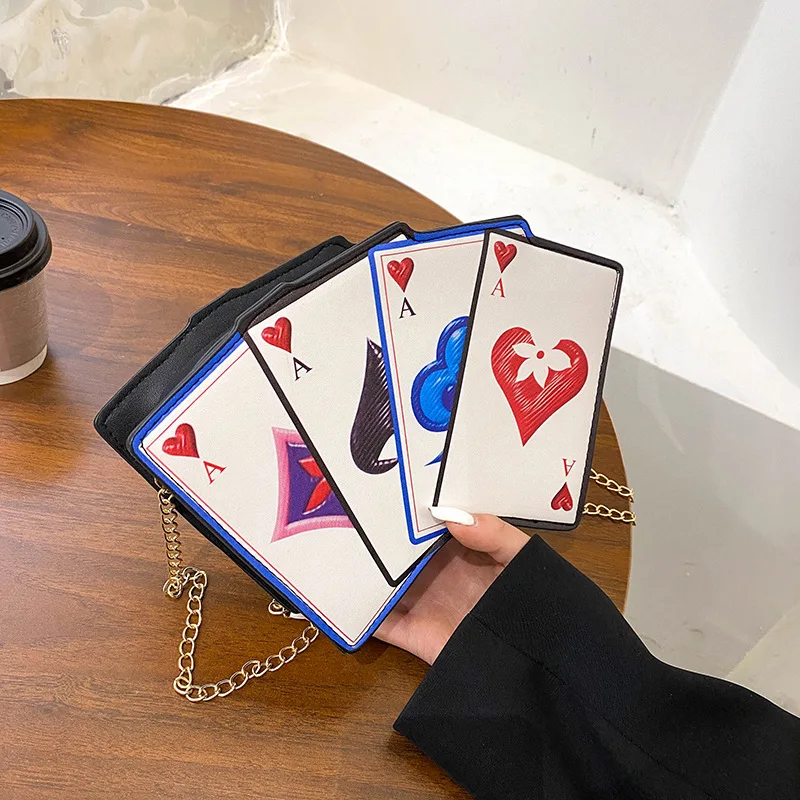 New fashion women funny personality creative shoulder bag contrast color playing card tower dollar pu messenger bag female
New fashion women funny personality creative shoulder bag contrast color playing card tower dollar pu messenger bag female
