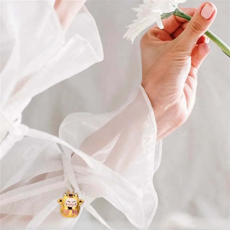 1 Set 12Pcs Fortune Cat Shape Bells Pet Bells DIY Supplies (Red Black Golden)
1 Set 12Pcs Fortune Cat Shape Bells Pet Bells DIY Supplies (Red Black Golden)