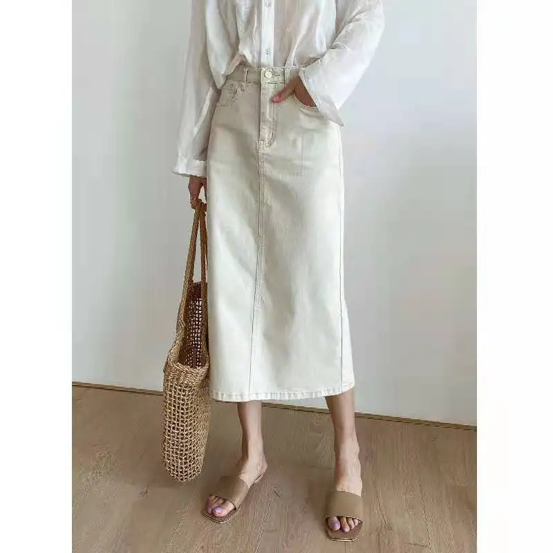 2021 summer new Korean version temperament commuting rice white denim skirt casual back slit medium long skirt 8706
2021 summer new Korean version temperament commuting rice white denim skirt casual back slit medium long skirt 8706