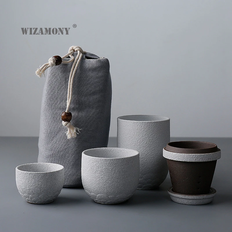 WIZAMONY Drinkware Kungfu Tea Set Tea Cup Pottery Ceramic Cup Filter Teapot for Travel Japanese Style Tea Set Kettle Coffee
WIZAMONY Drinkware Kungfu Tea Set Tea Cup Pottery Ceramic Cup Filter Teapot for Travel Japanese Style Tea Set Kettle Coffee