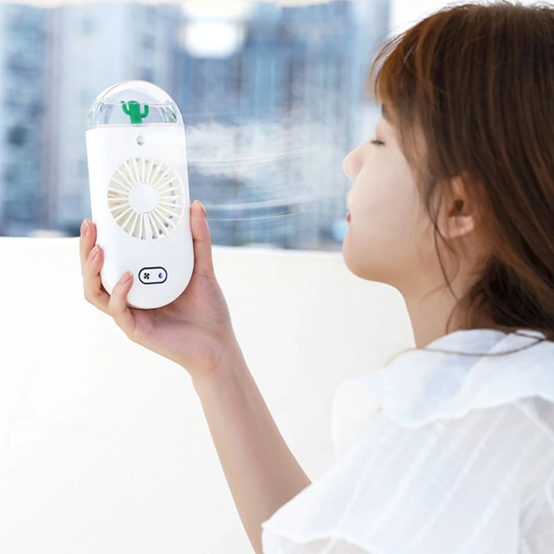 Water Mist Fan Usb Rechargeable Handheld Air Conditioning 3 Gears Adjustable for Summer days for girls Women gift 
Water Mist Fan Usb Rechargeable Handheld Air Conditioning 3 Gears Adjustable for Summer days for girls Women gift