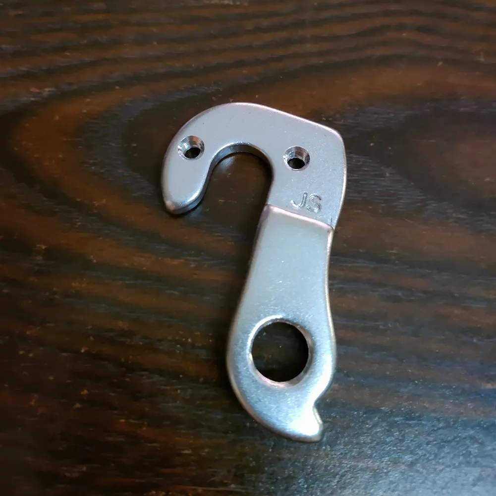 MTB Bike Bicycle REAR DERAILLEUR GEAR MECH HANGER Tail Hook For Various Frames Cycling Mountain Frame Gear Tail Hook Parts
MTB Bike Bicycle REAR DERAILLEUR GEAR MECH HANGER Tail Hook For Various Frames Cycling Mountain Frame Gear Tail Hook Parts