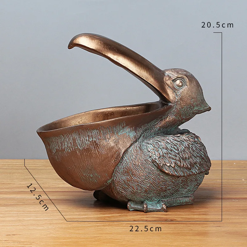 22cm Resin Pelican Statue Key Candy Container for Home Decoration Accessories Storage Table Desk Decor Living Room
22cm Resin Pelican Statue Key Candy Container for Home Decoration Accessories Storage Table Desk Decor Living Room