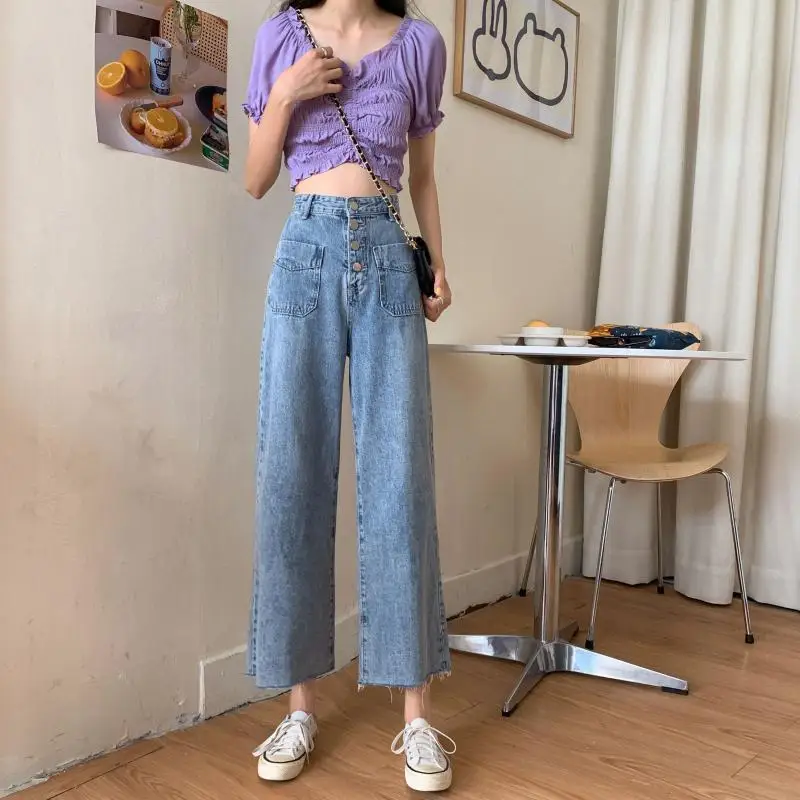 2021 new Korean elegant jeans women's spring and summer high waist straight pants loose Capris show thin pants trend
2021 new Korean elegant jeans women's spring and summer high waist straight pants loose Capris show thin pants trend