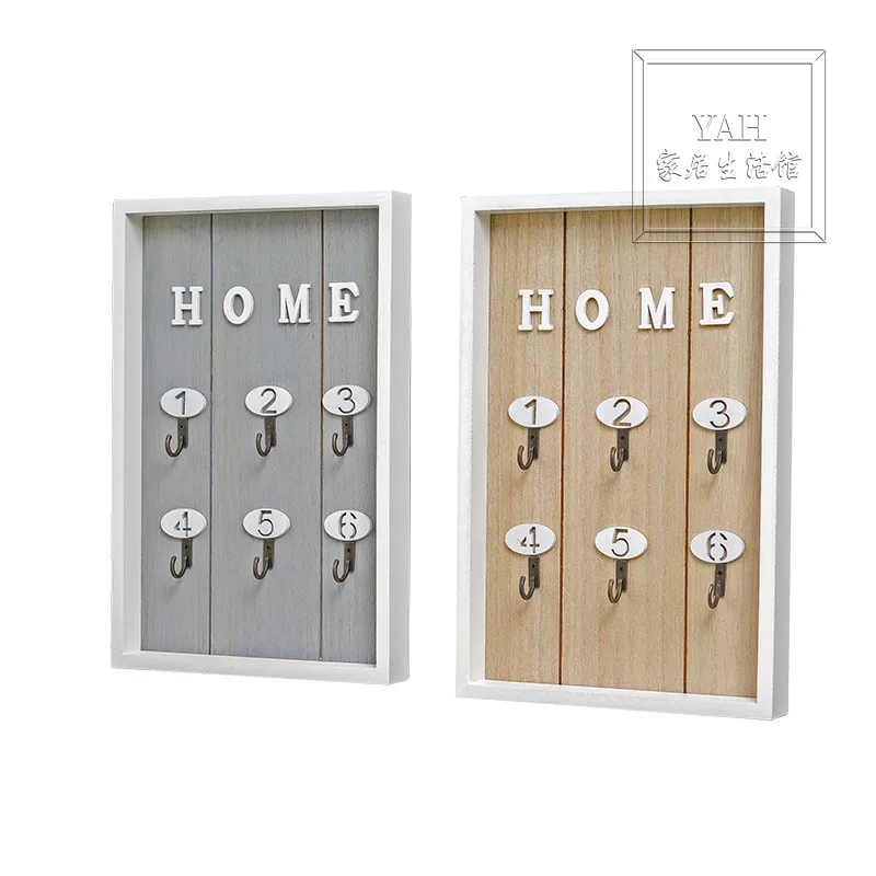 On The Shoe Cabinet on The Wall, The Key Storage Box Is Hung on The Wall 
On The Shoe Cabinet on The Wall, The Key Storage Box Is Hung on The Wall