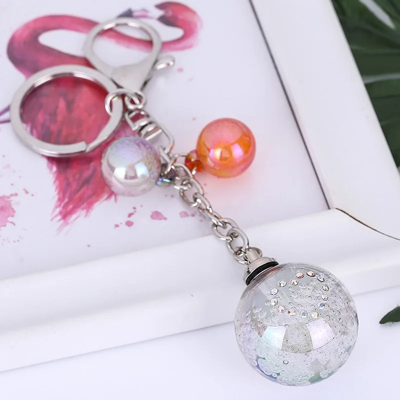 New Creative Dazzle Colorful Glass Ball Key Ring Jewelry Lovely Lamp Ball Key Chain Bag Car Pendant Attractive Woman's Gift Hot
New Creative Dazzle Colorful Glass Ball Key Ring Jewelry Lovely Lamp Ball Key Chain Bag Car Pendant Attractive Woman's Gift Hot