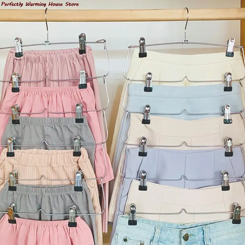 Вешалка для юбки, брюк, шортов, 4/6 уровней, с регулируемыми зажимами, не скользит, 12 зажимов, металлическая вешалка для хранения одежды
Вешалка для юбки, брюк, шортов, 4/6 уровней, с регулируемыми зажимами, не скользит, 12 зажимов, металлическая вешалка для хранения одежды