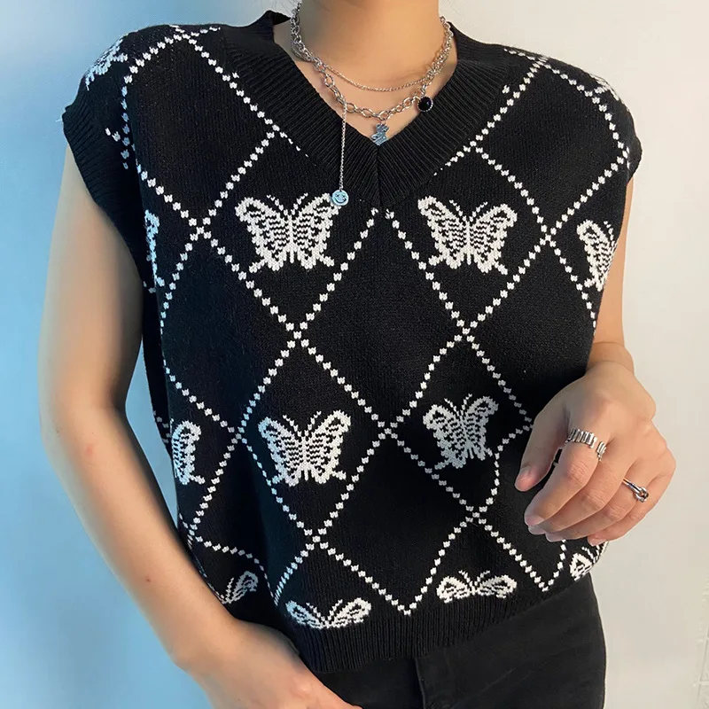 Жилет женский трикотажный в стиле Харадзюку, Укороченный джемпер без рукавов, с V-образным вырезом, укороченная майка в стиле преппи, винтаж...
Жилет женский трикотажный в стиле Харадзюку, Укороченный джемпер без рукавов, с V-образным вырезом, укороченная майка в стиле преппи, винтаж...